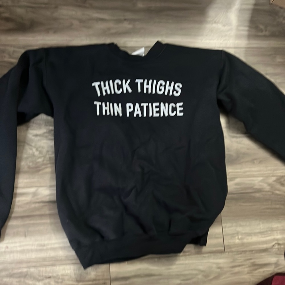 Crew neck sweater.